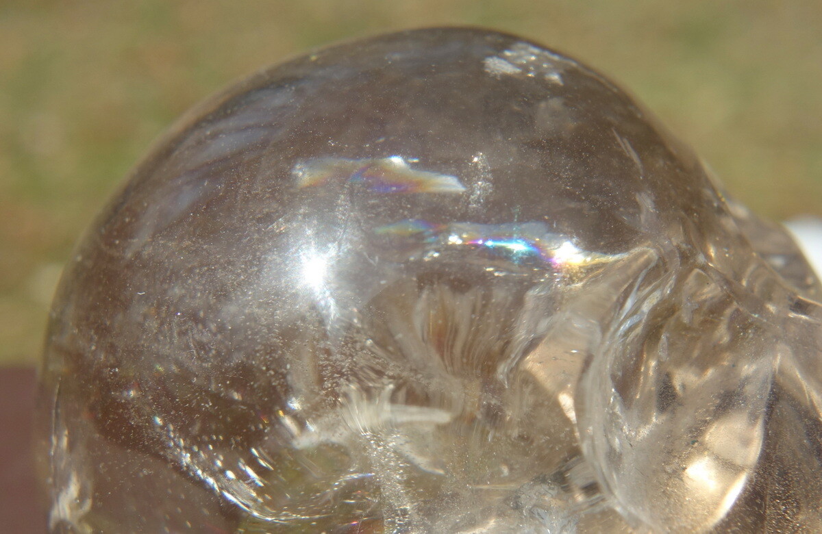 Quartz Crystal Skull Carving with Rainbows and a Touch of Smoky
