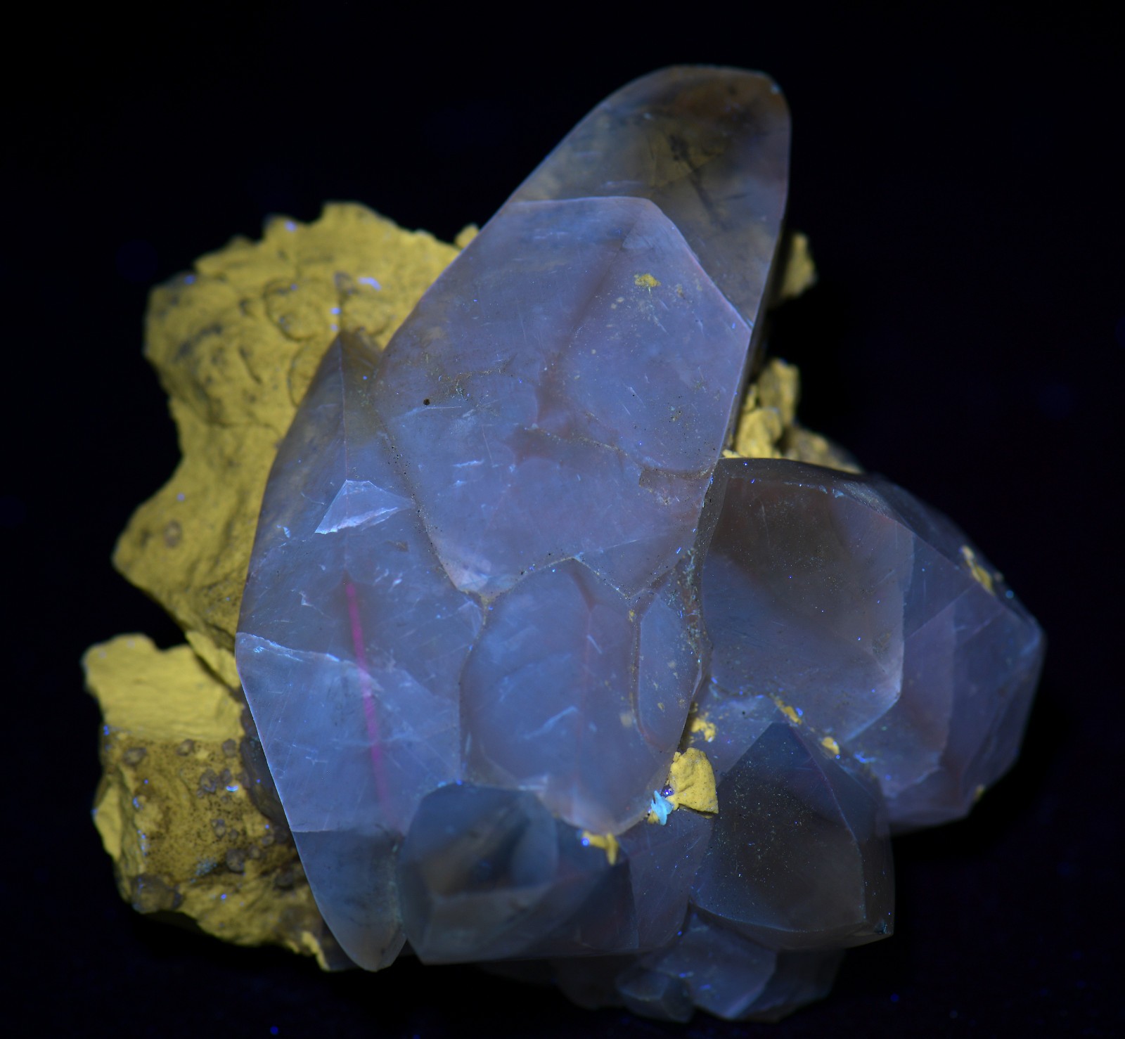 Calcite crystals on Limestone matrix, fluorescent. Indiana. 101 grams.