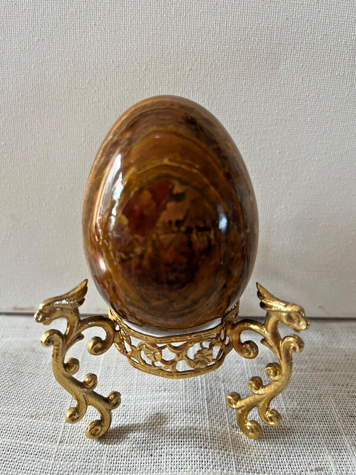 Gold Tripod dragons stand brown and reddish-brown stone Brazilian jasper egg..