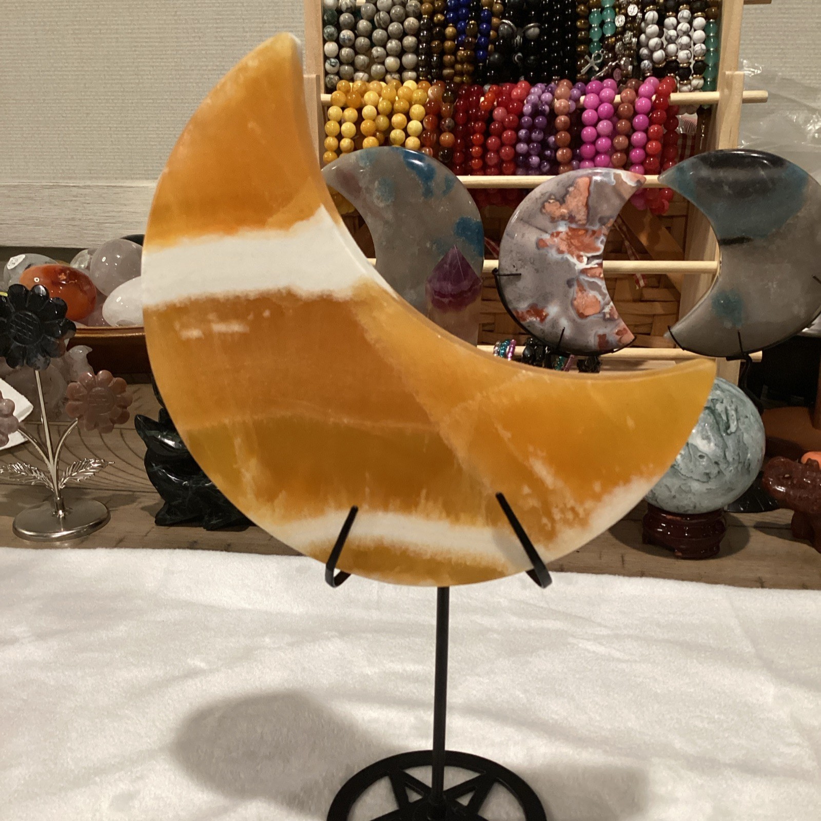 Polished Orange White Calcite Crescent Moon Crystal Specimen on Stand 6in 15 oz