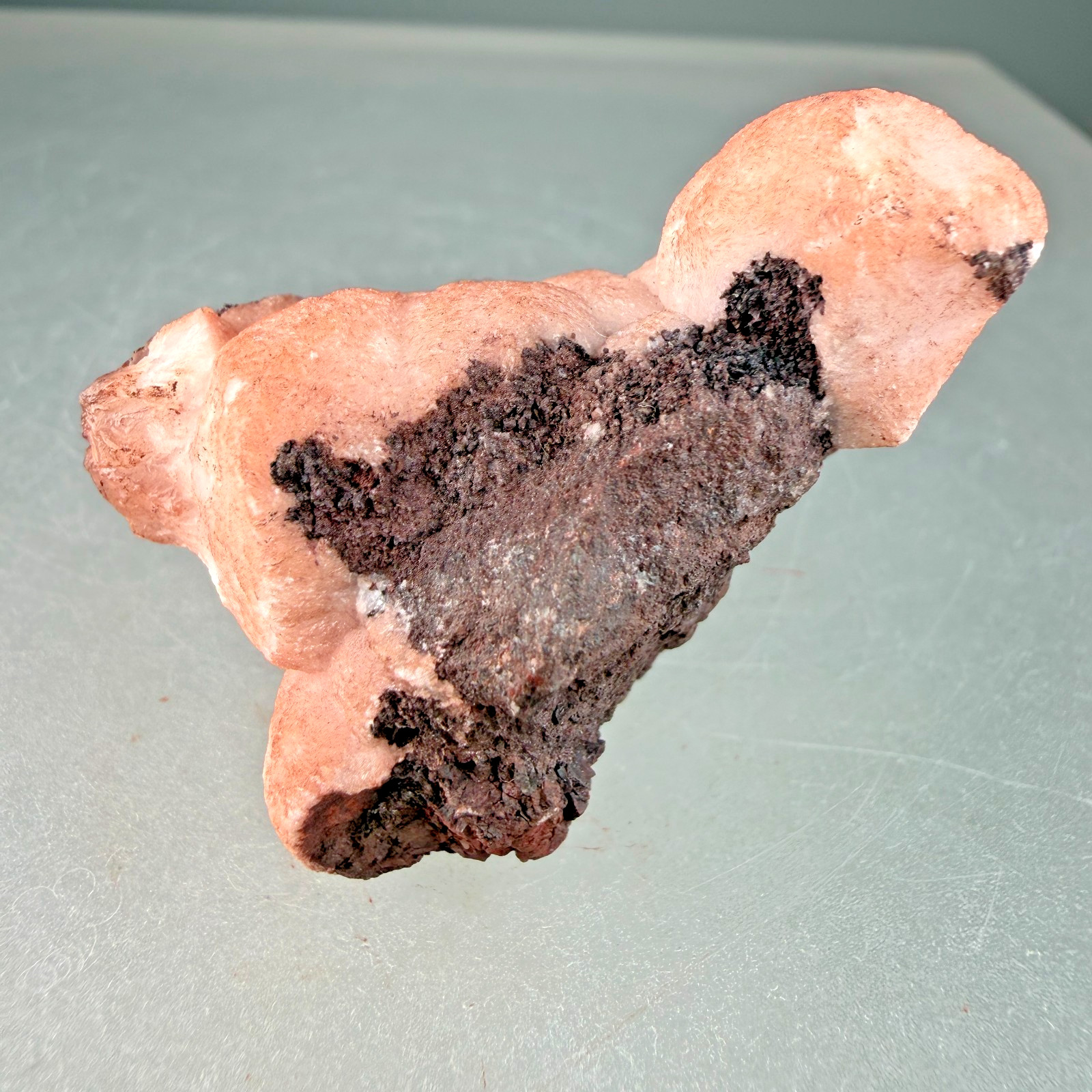 Vibrant Pink Manganocalcite on Hematite: Montreal Mine, Iron County, Wisconsin