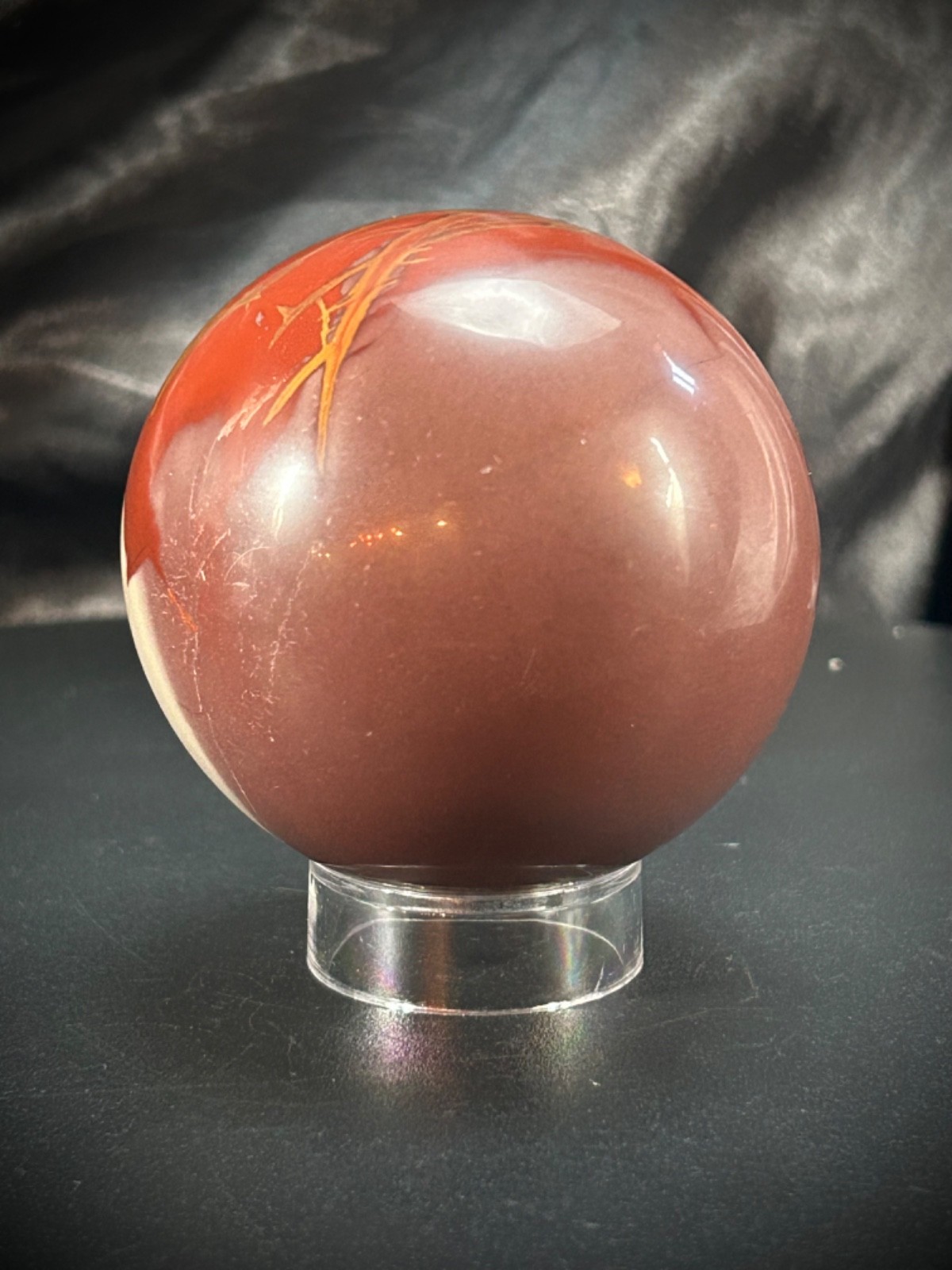 2.49″ Red Noreena Jasper Sphere With Acrylic Stand 12.3oz (350 grams)