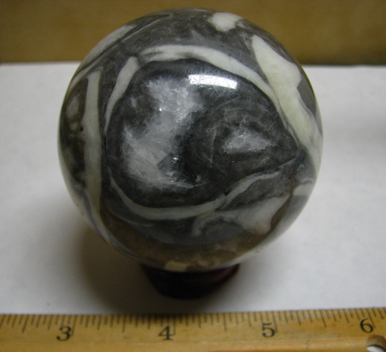 .83lb 2.5inch 1000 EYE JASPER FOSSIL SPHERE W/QUARTZ WOOD STAND MADAGASCAR #087
