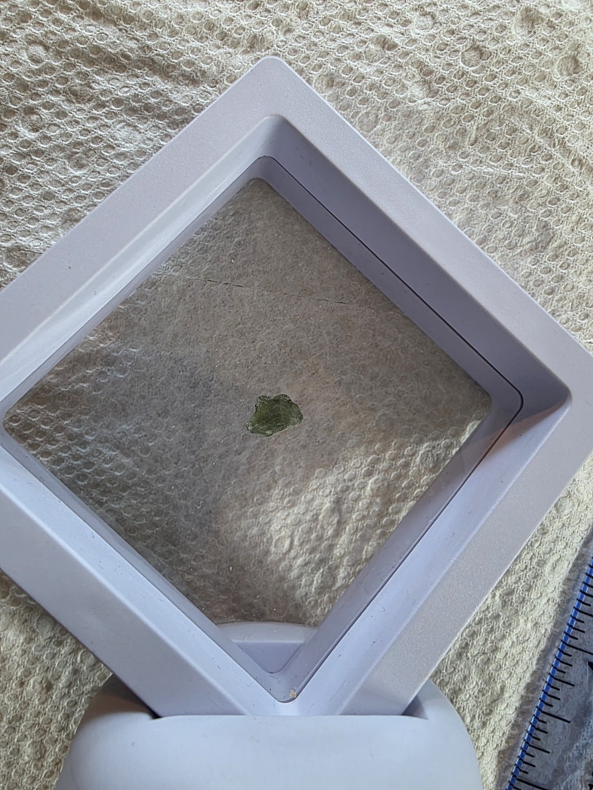 Moldavite Specimen in Display Case
