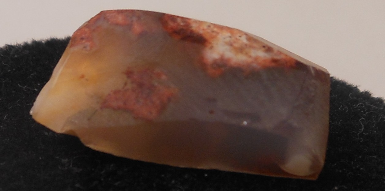 10.50ct Mexican Fire Opal (facet rough cut) (see photos) in Host 19mm x 9mm