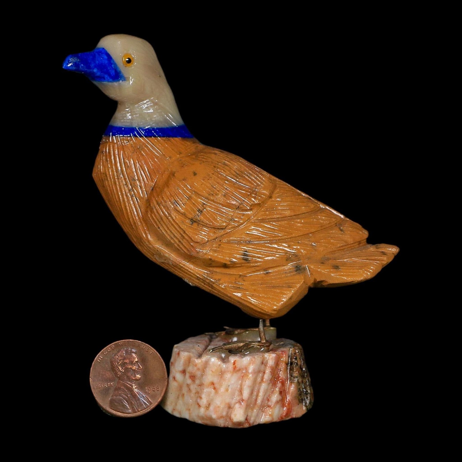 3.5″ Hand Carved Duck Perched on Red White Calcite, Brown Calcite, And Sodalite