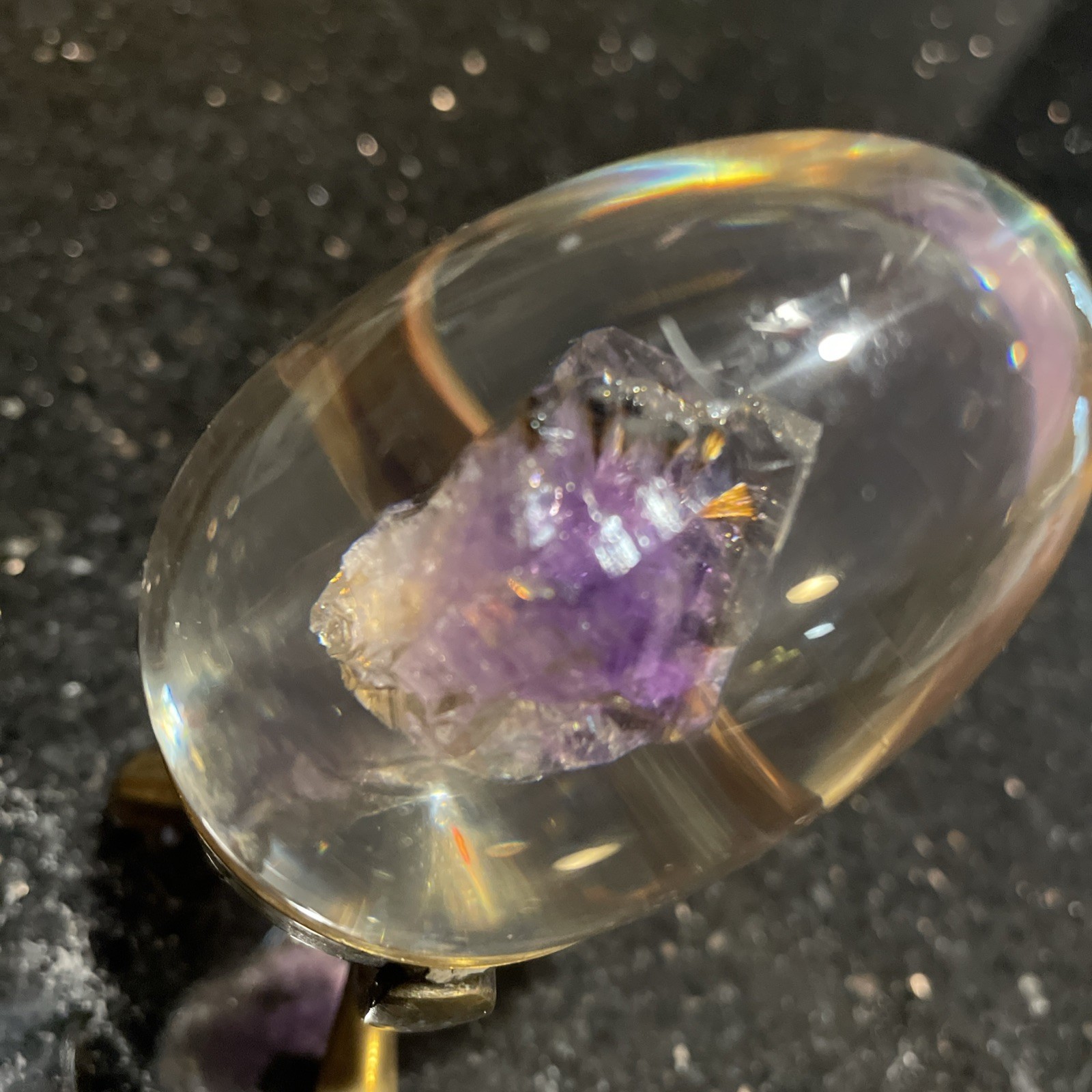 Amethyst Egg Encased In Lucite With Linear Inclusions With Brass Stand