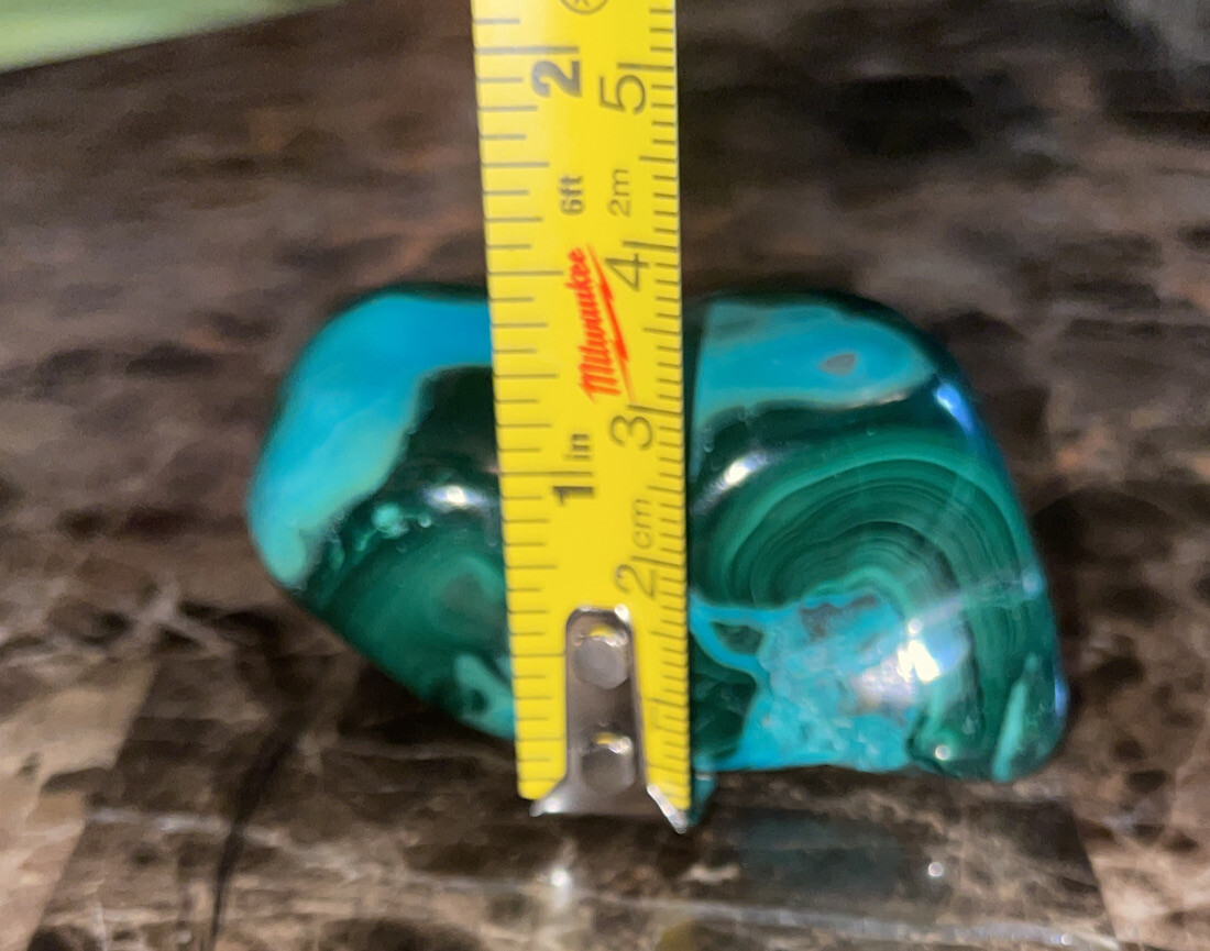 6.1oz Dark Green Malachites. Length 2 3/8”, Width 1 3/4”, Height 1 3/8”