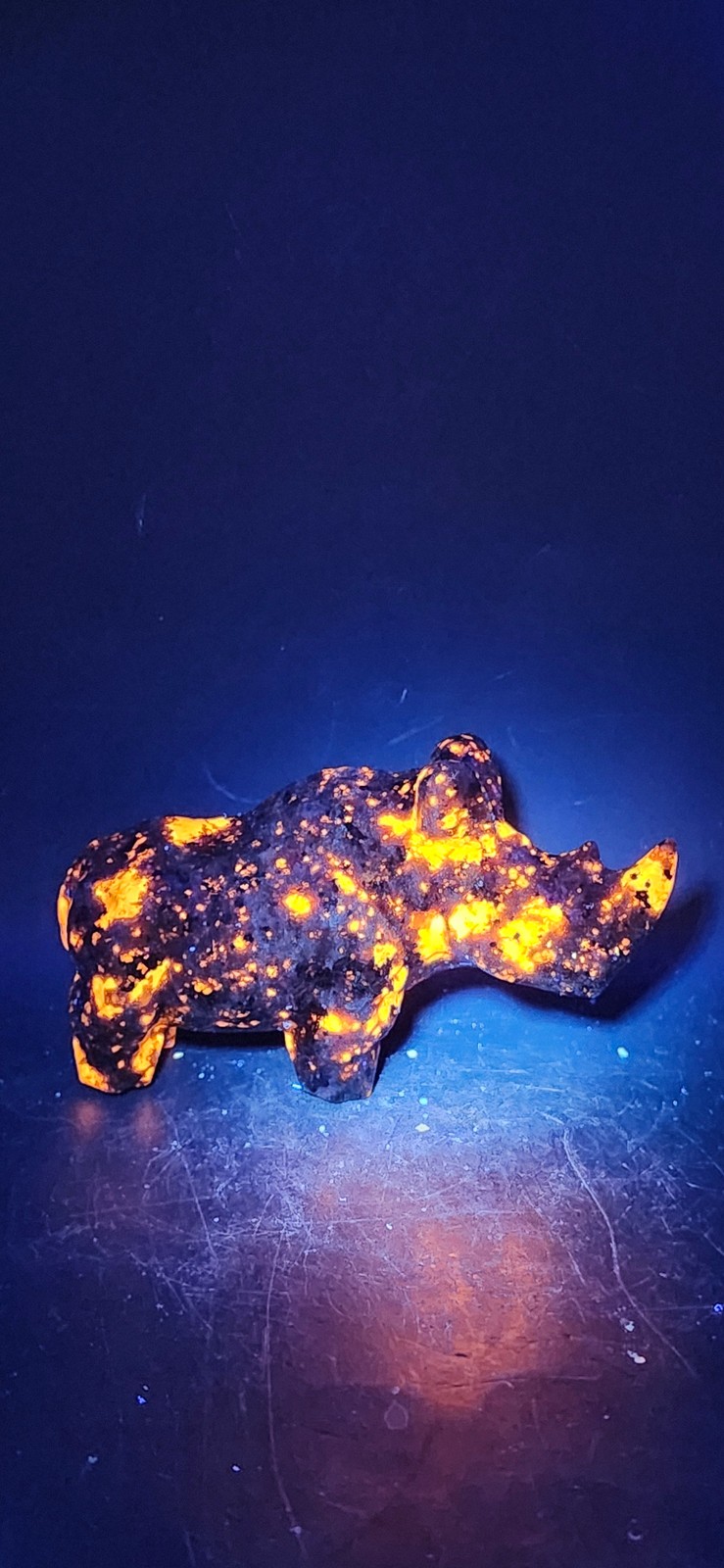Flame stone “yooperlite” rhino! 8.5 ounces, 4 inches long, 2 tall