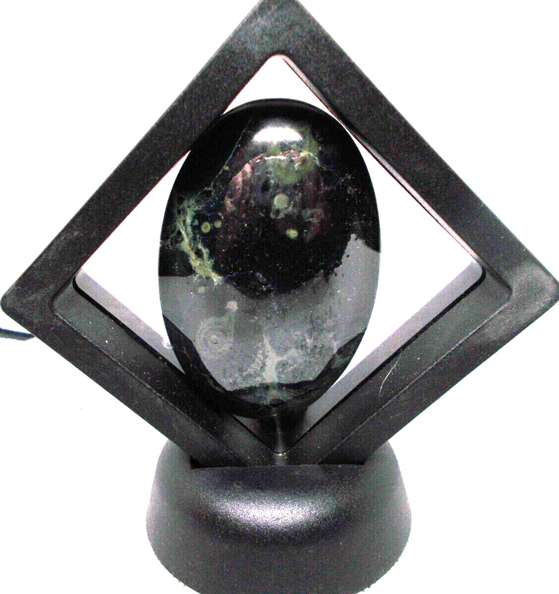 Kumbala jasper palm stone 2 1/2″ x 1 1/2″ in display frame