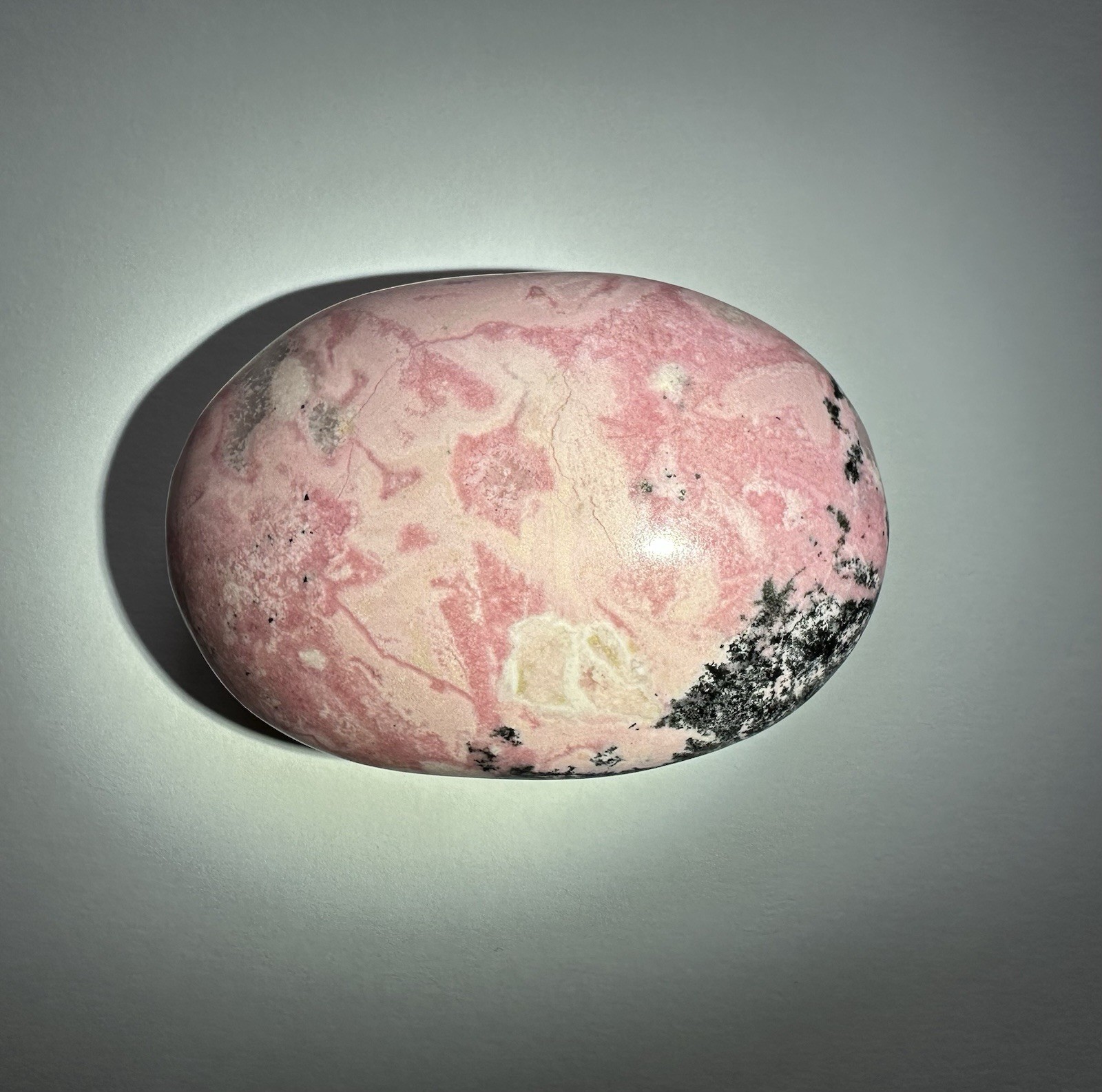 Polished Pink Rhodonite Palm Stone, Oval Egg Shape Mineral Specimen, 3 in