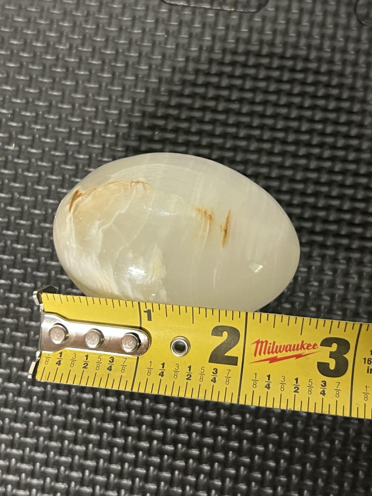 Polished Orange Calcite Stone Egg. 2 1/2 in High, 1 1/2 in Wide. Preowned.