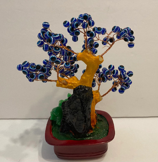 An elegant Blue Cat’s Eye Tree with Elephant.It brings luck, prosperity, provide