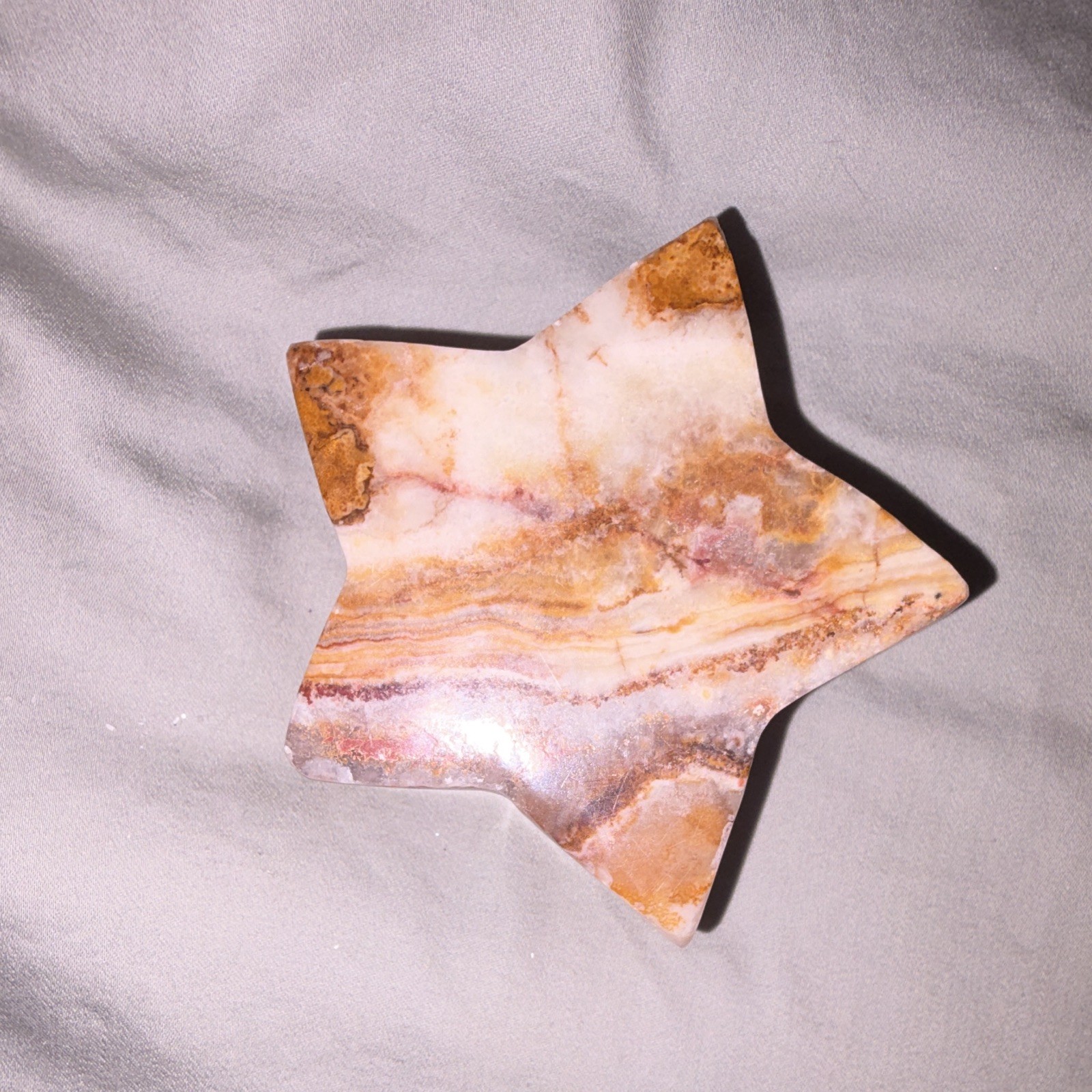Star-Shaped Carved green onyx candle holder – White & Brown Marbled Stone Design