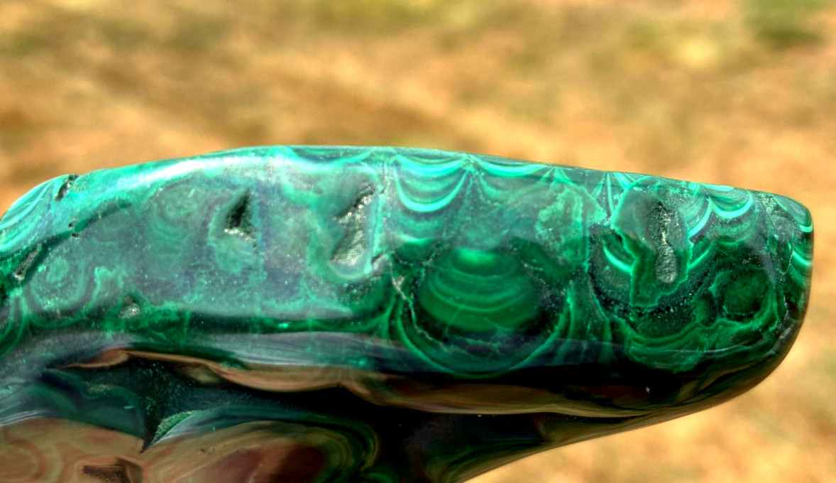 POLISHED MALACHITE WITH ” EYES” – 3 1/2 in. long