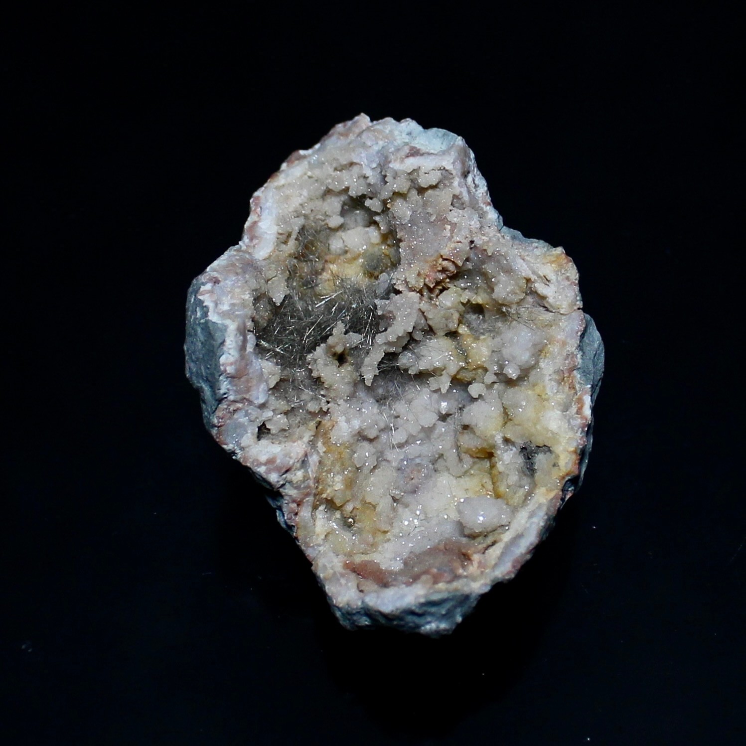 MILLERITE. Hwy. 27 road cut, Halls Gap, Lincoln Co. Kentucky. #5002