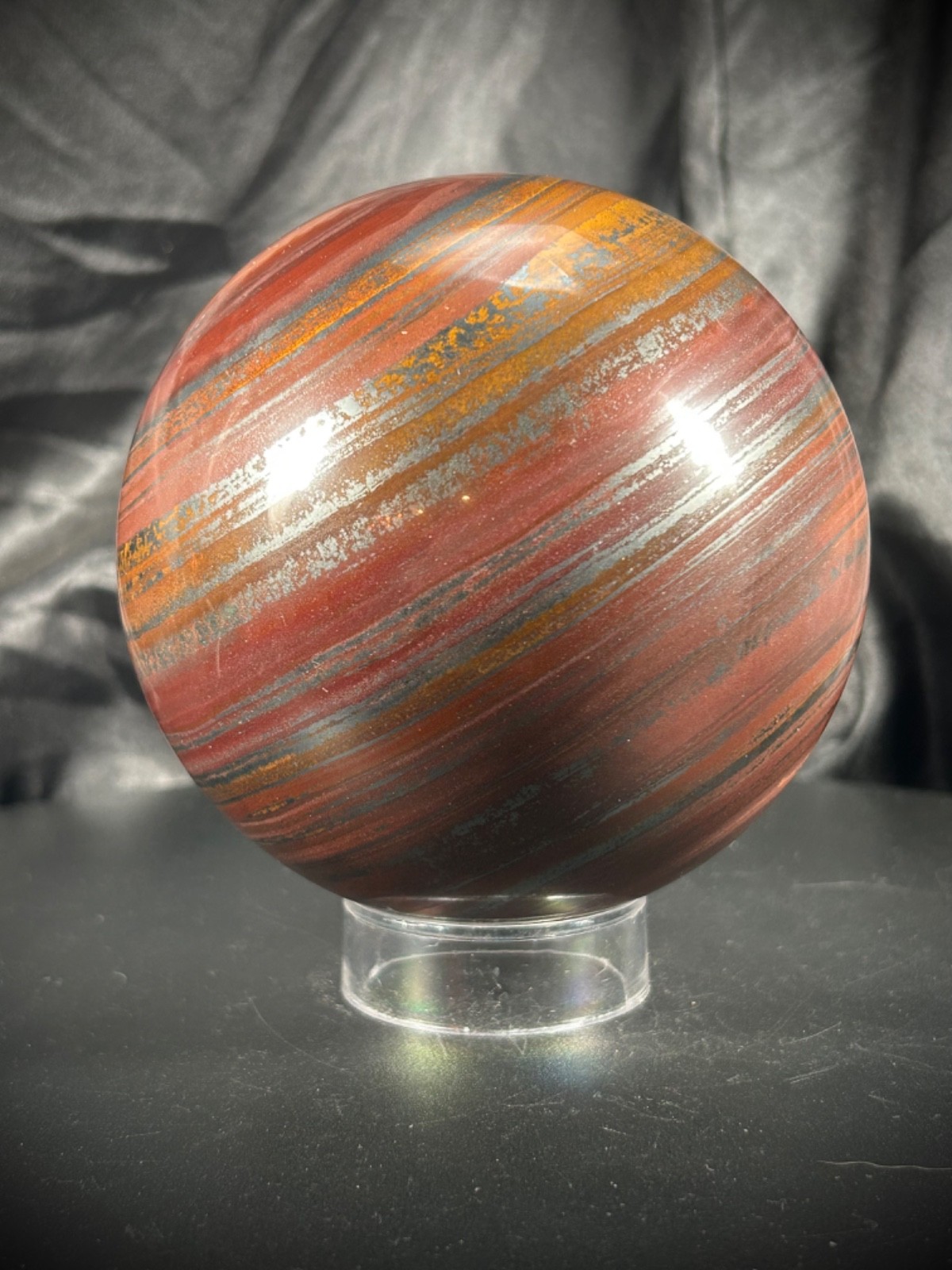4.05″ Tiger Iron (AKA Mugglestone) Sphere With Acrylic Stand 4lb 5.5oz (1.968KG)