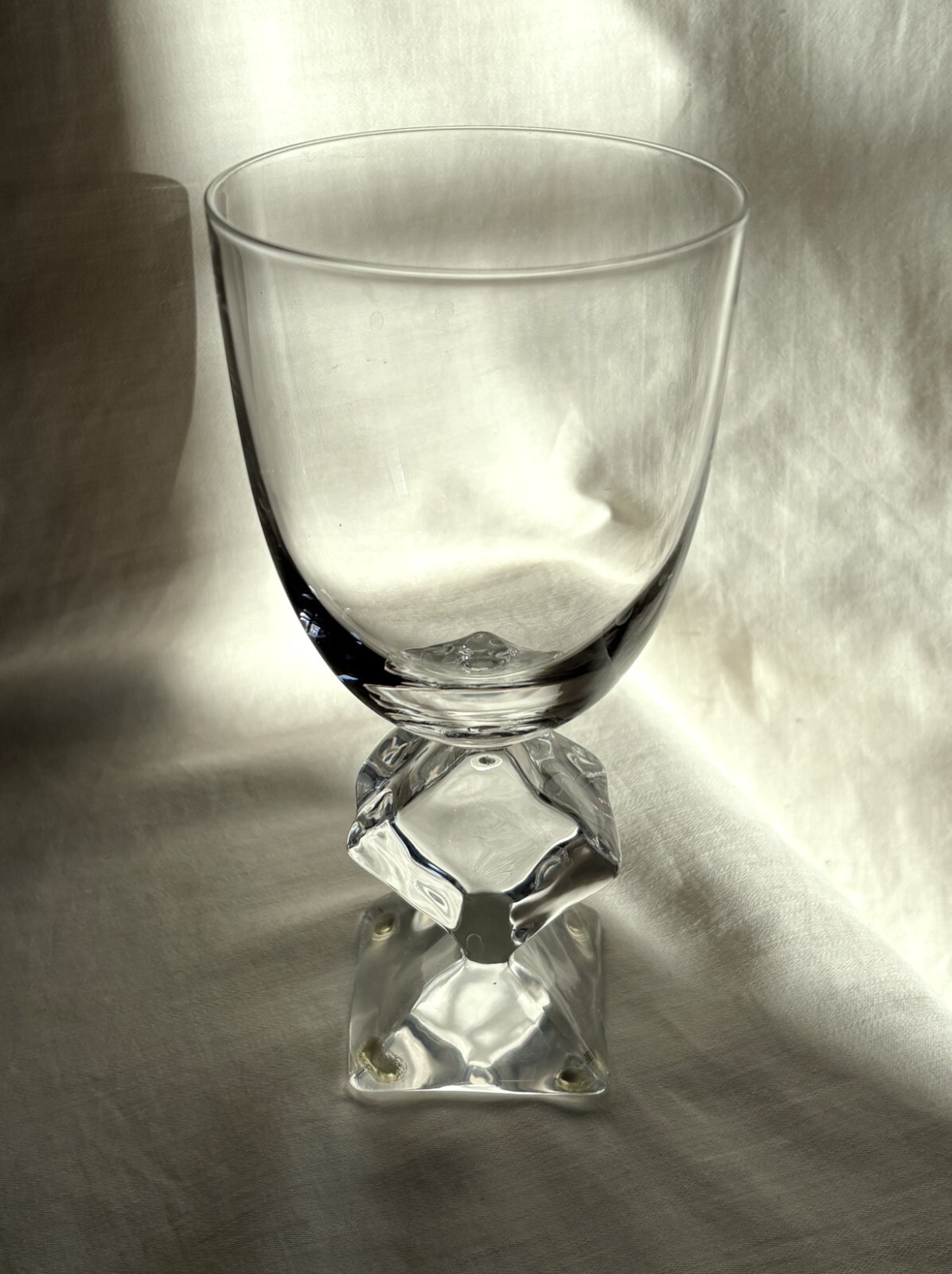 French crystal table glass with Lucite stem melting ice cube. 7″ h. Vintage 1970