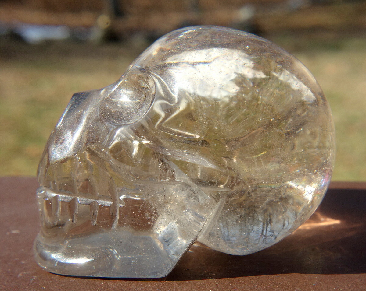 Quartz Crystal Skull Carving with Rainbows and a Touch of Smoky
