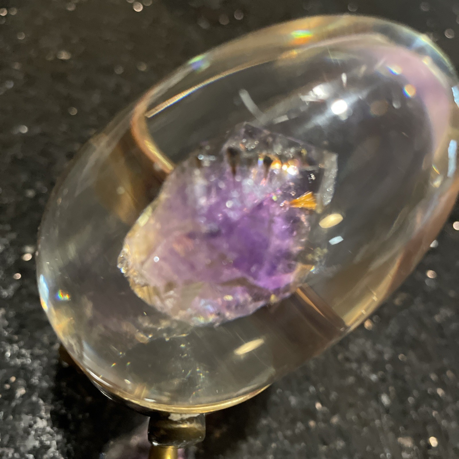 Amethyst Egg Encased In Lucite With Linear Inclusions With Brass Stand