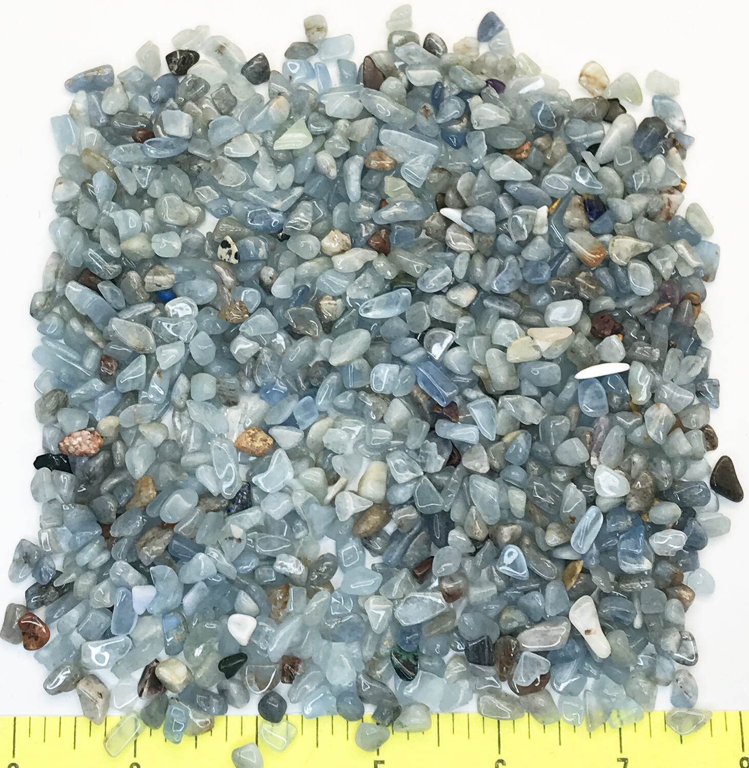 Aquamarine Mini (5-7mm or 3/16-1/4″) polished light blue gem stones. 1/2 lb.