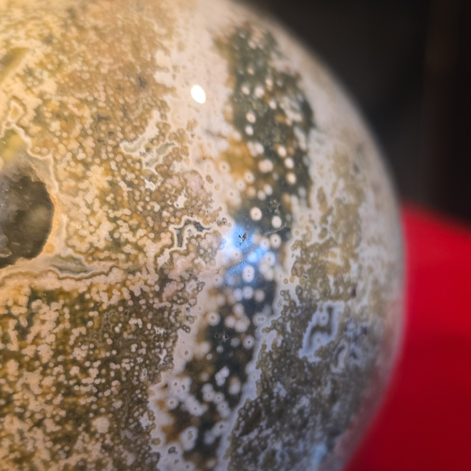 Polished 8th vein Ocean Jasper Sphere Decorative Piece with Stand
