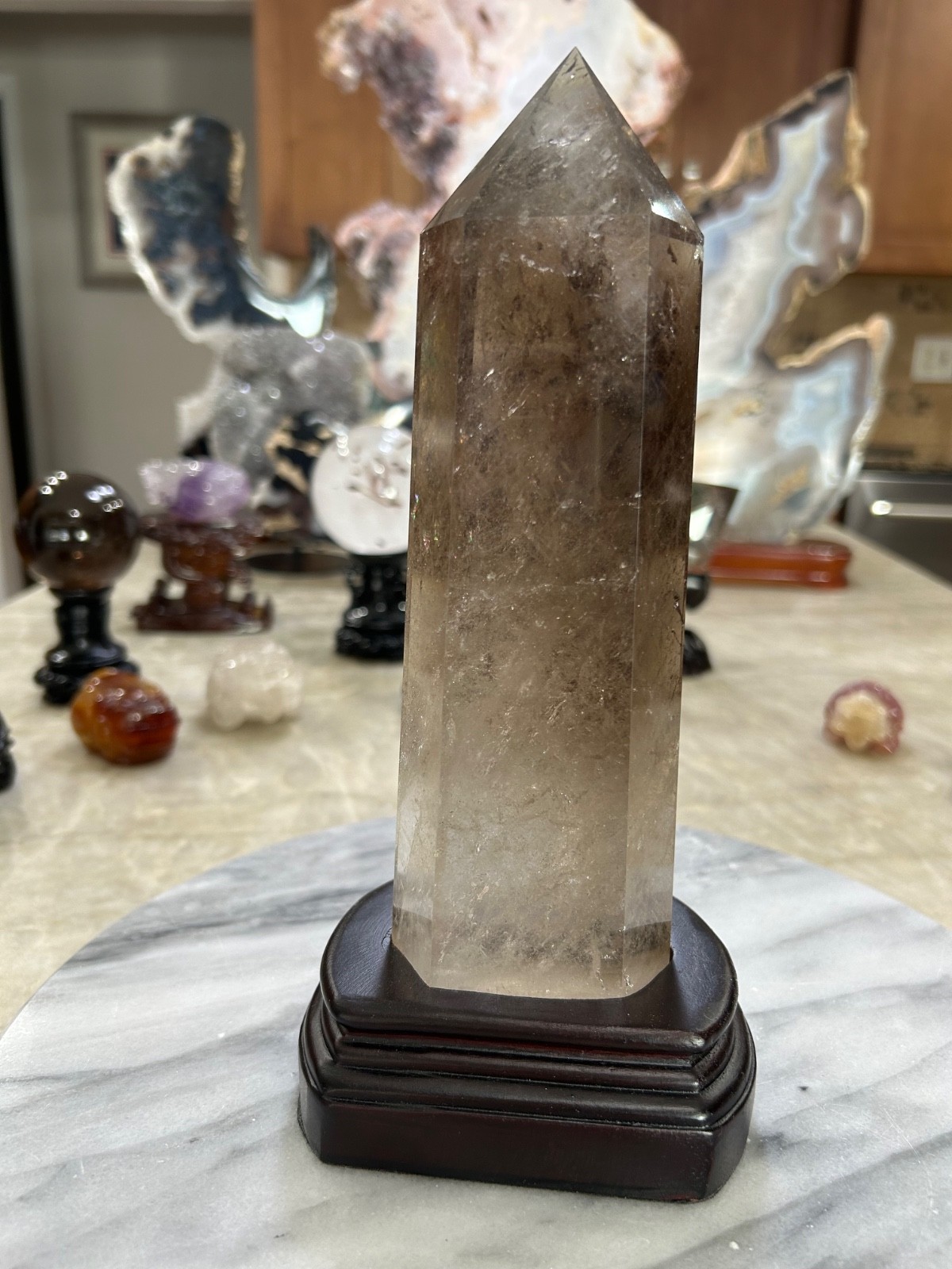 Smoky quartz tower with custom wood stand