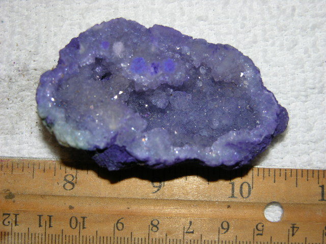 Geode cut & polished half with colored crystal center 2.5 inch E66