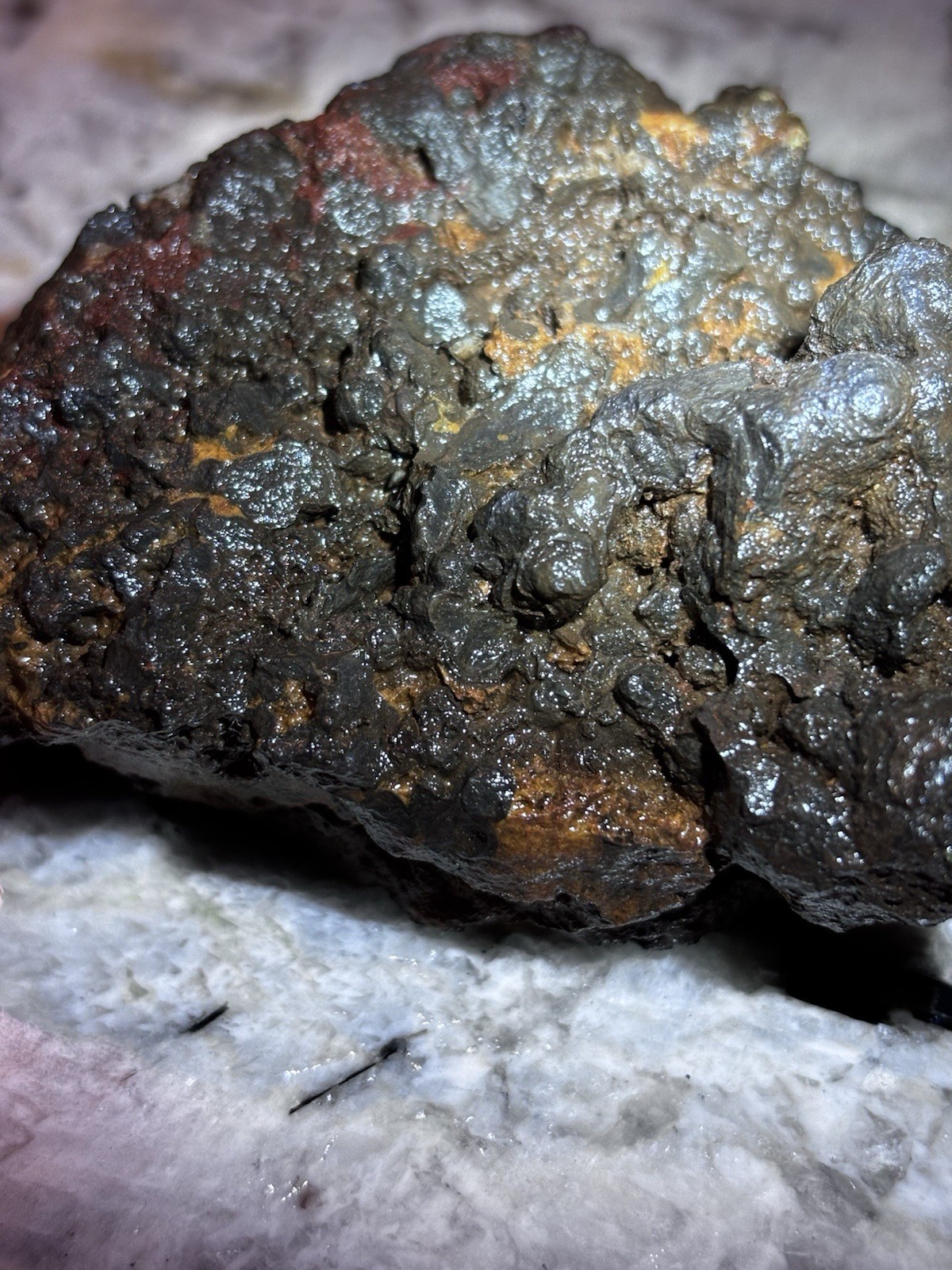 this rock looks like it came from hell! iron ore or silver ore ? meteorite?