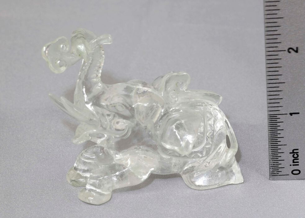 Hand-carved and hand-polished natural crystal quartz. elephant