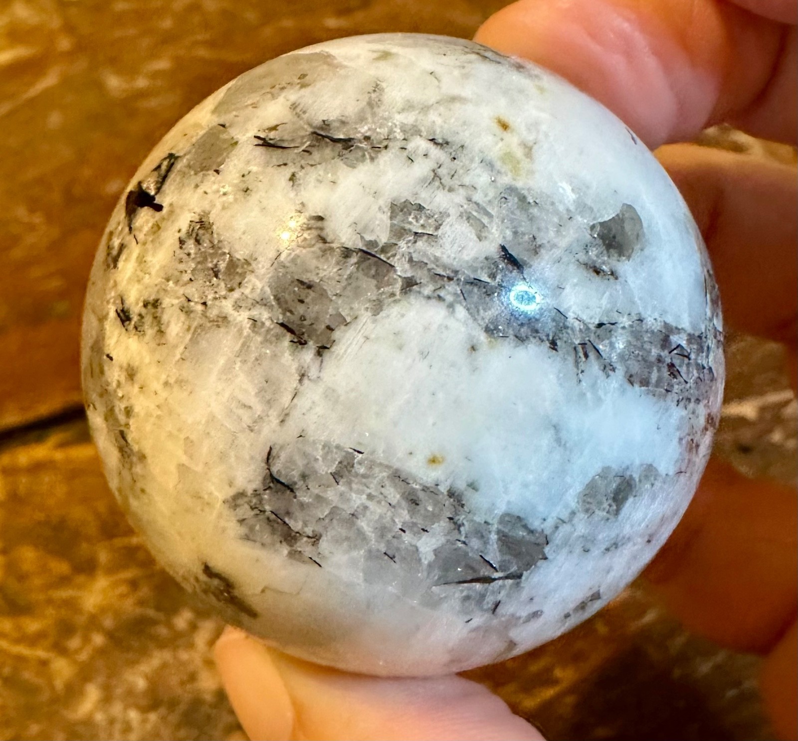 Moonstone sphere with tourmaline inclusions and metal horse stand Free shipping