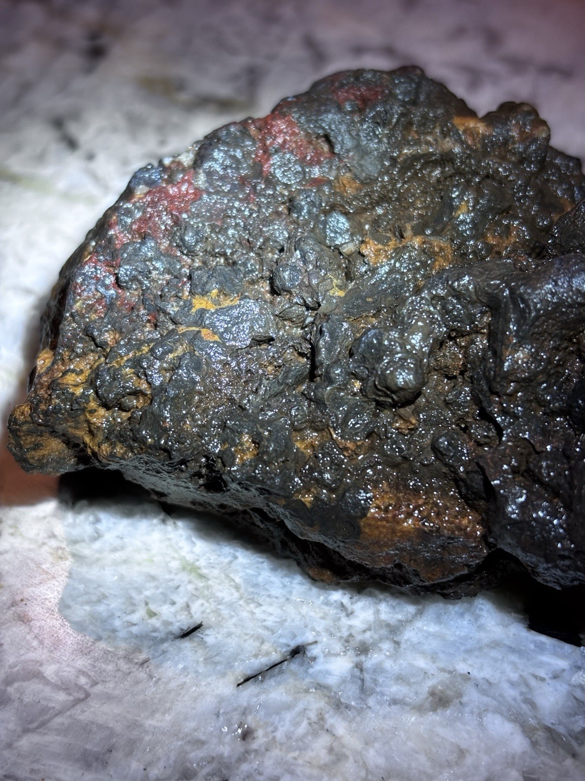 this rock looks like it came from hell! iron ore or silver ore ? meteorite?