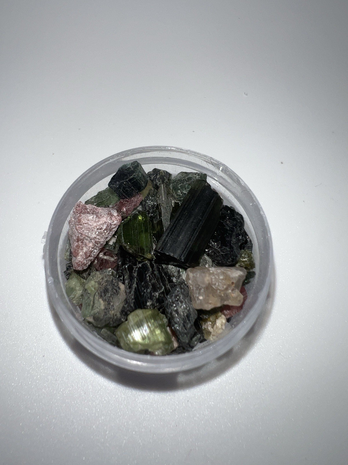 Mixed Natural Tourmaline Crystal Chips in Small Plastic Round Container
