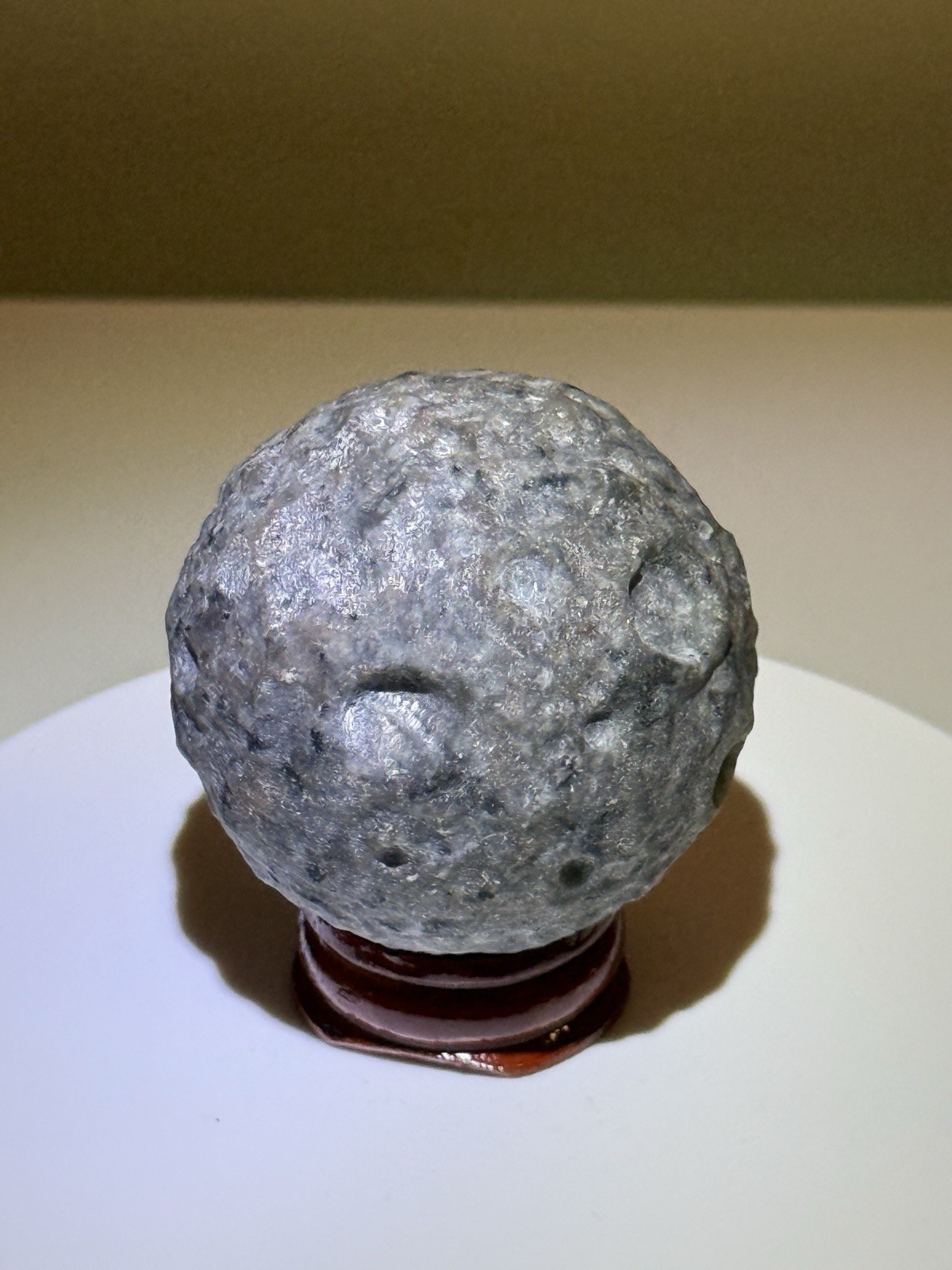 FLUORESCENT Sodalite-bearing Syenite (Yooperlite) Carved Moon Sphere w/ Stand