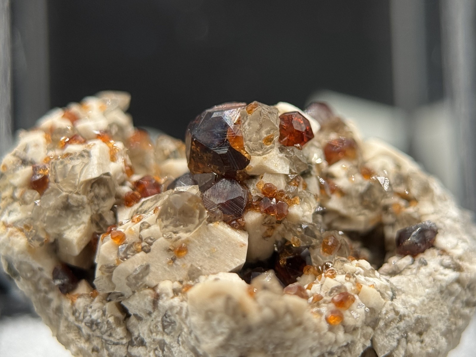 Exceptional spessartine garnets on smoky quartz & microcline from Fujian, China
