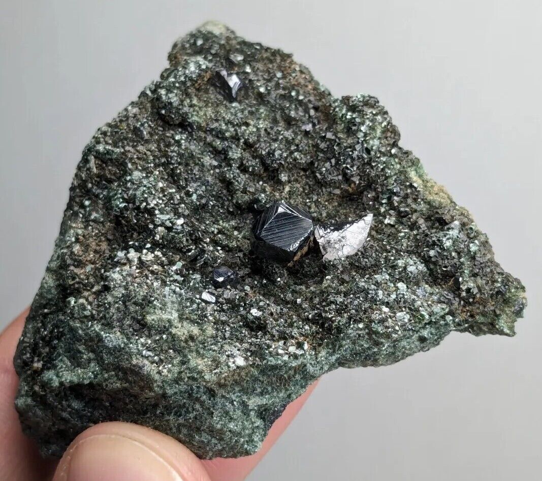 Beautiful sharp magnetite crystal with beautiful natural pattern on matrix rock