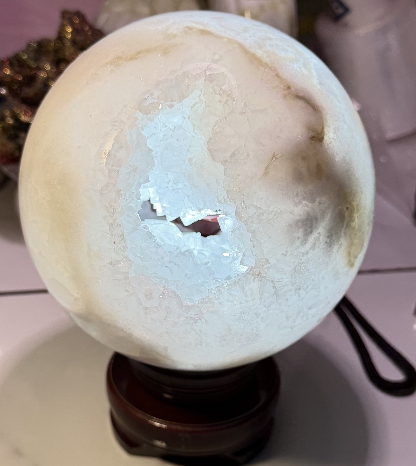 White Crystal Geode Sphere Mineral Display Specimen with Druzy Cavity on Stand