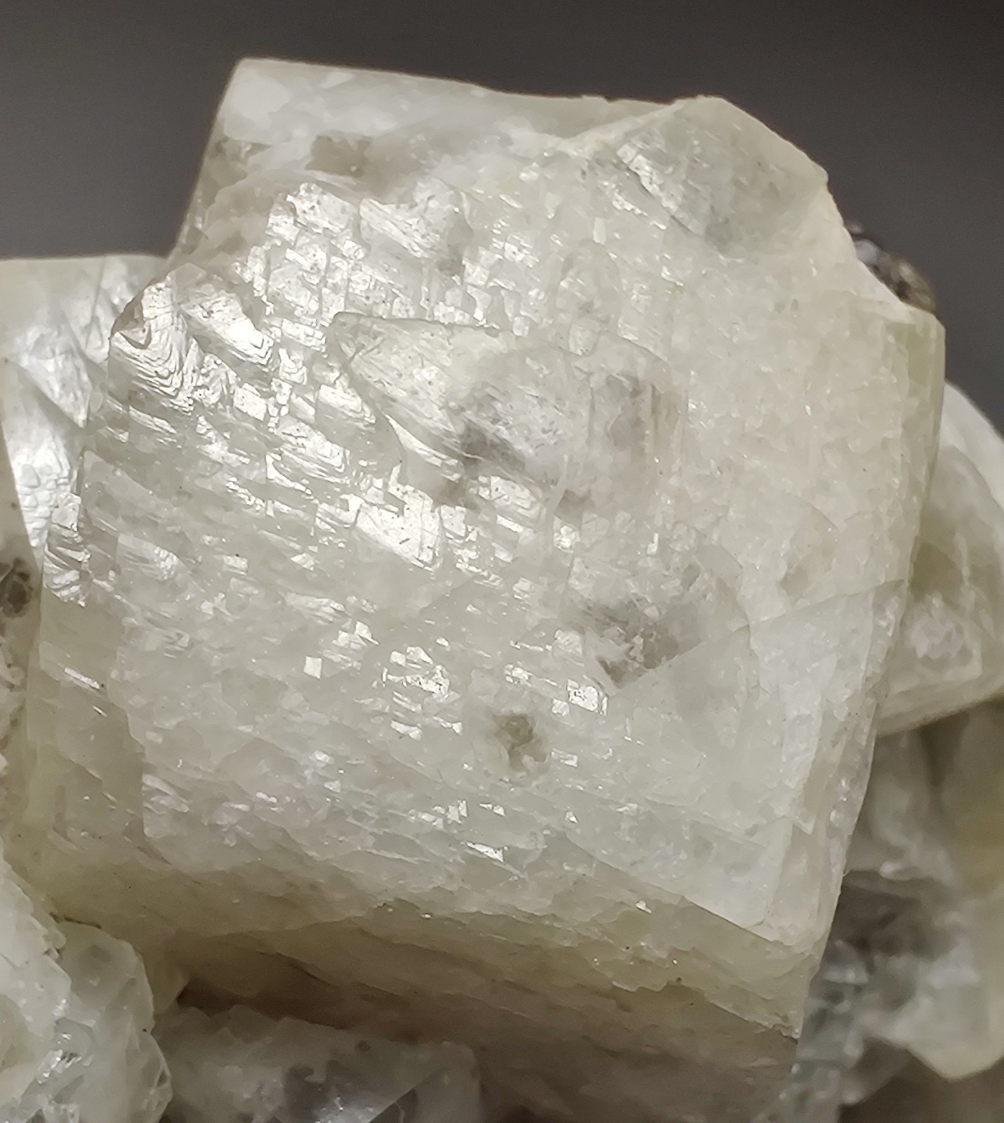 Calcite crystals on matrix, unique form, fluorescent white. 215 grams.