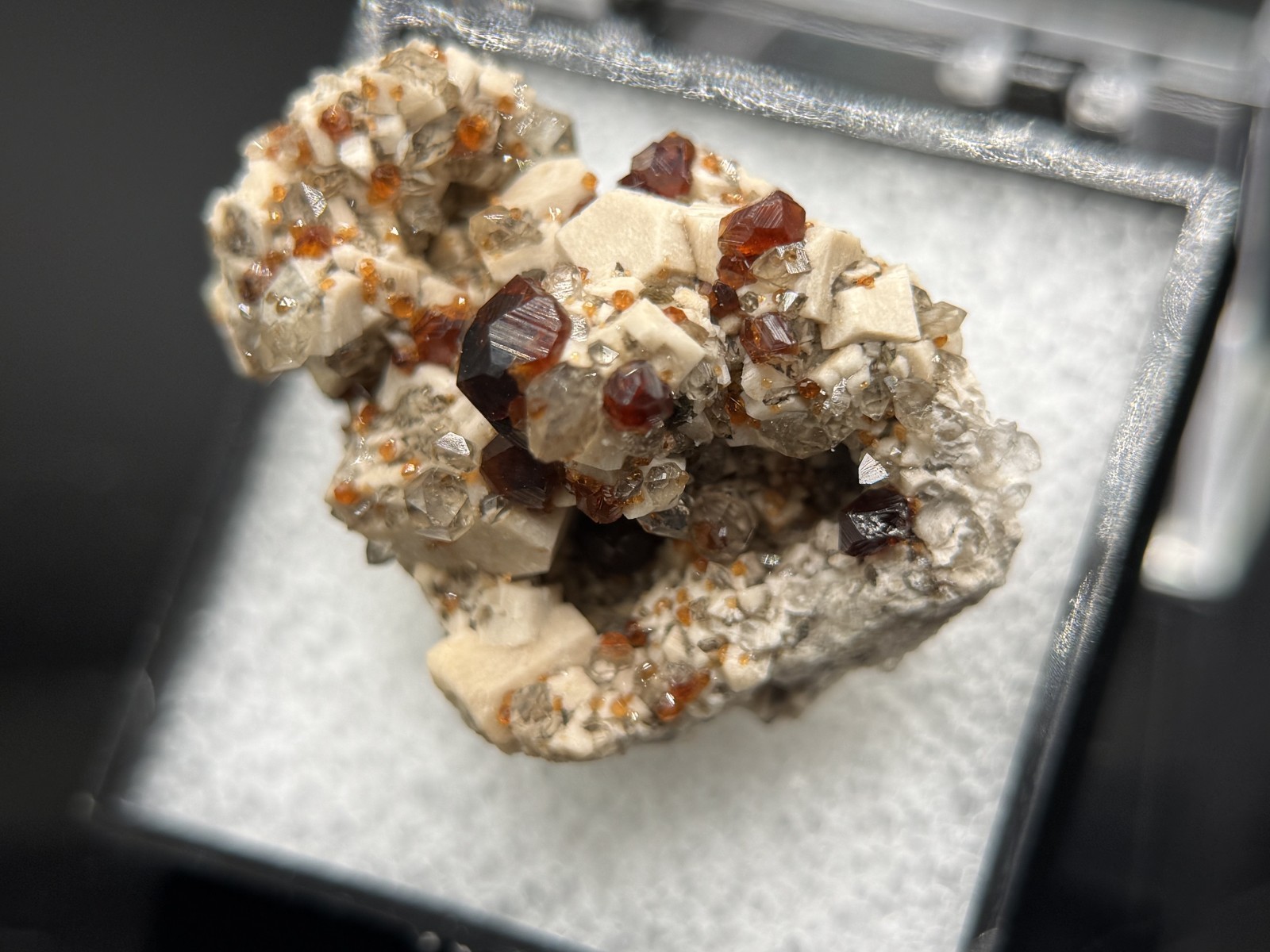 Exceptional spessartine garnets on smoky quartz & microcline from Fujian, China