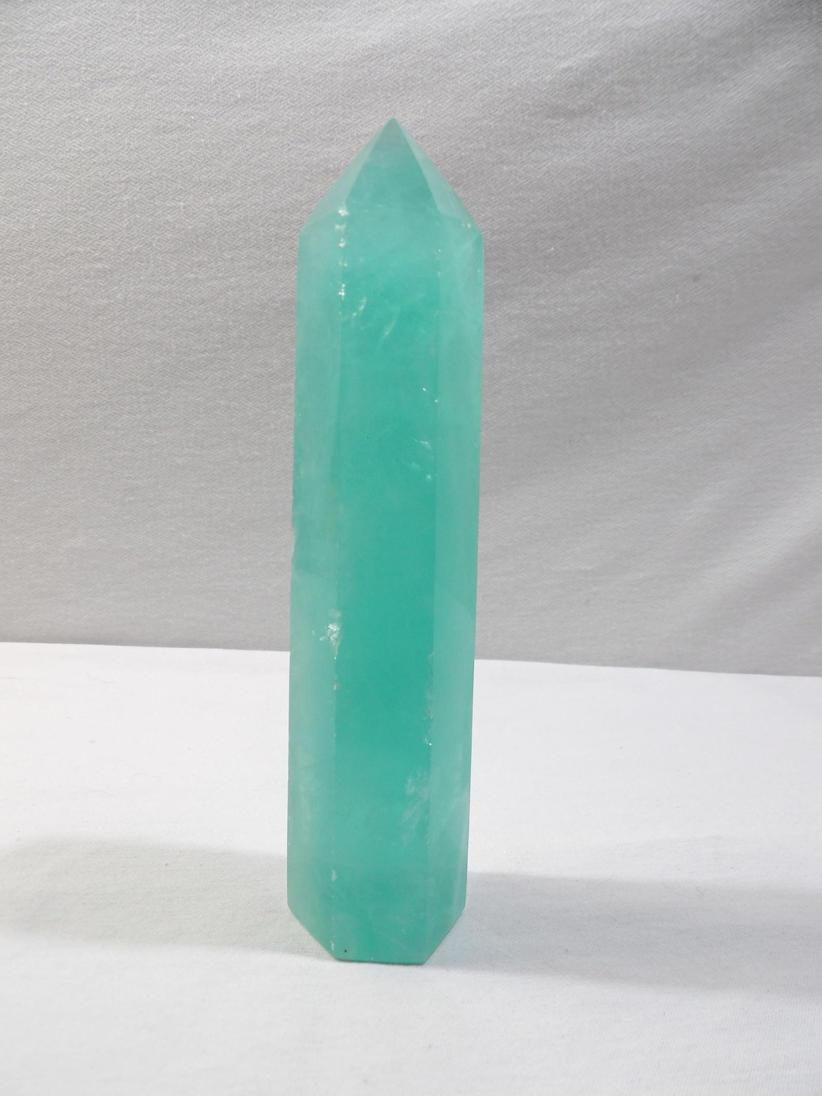 Green fluorite crystal tower, hexagon column obelisk, 6.75L X 1.75W, translucent