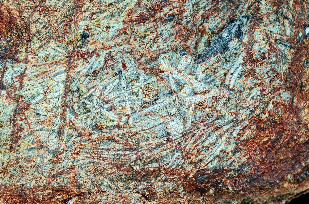 Komatiite Ultramafic mantle derived volcanic rock + Spinifex Barberton S. Africa