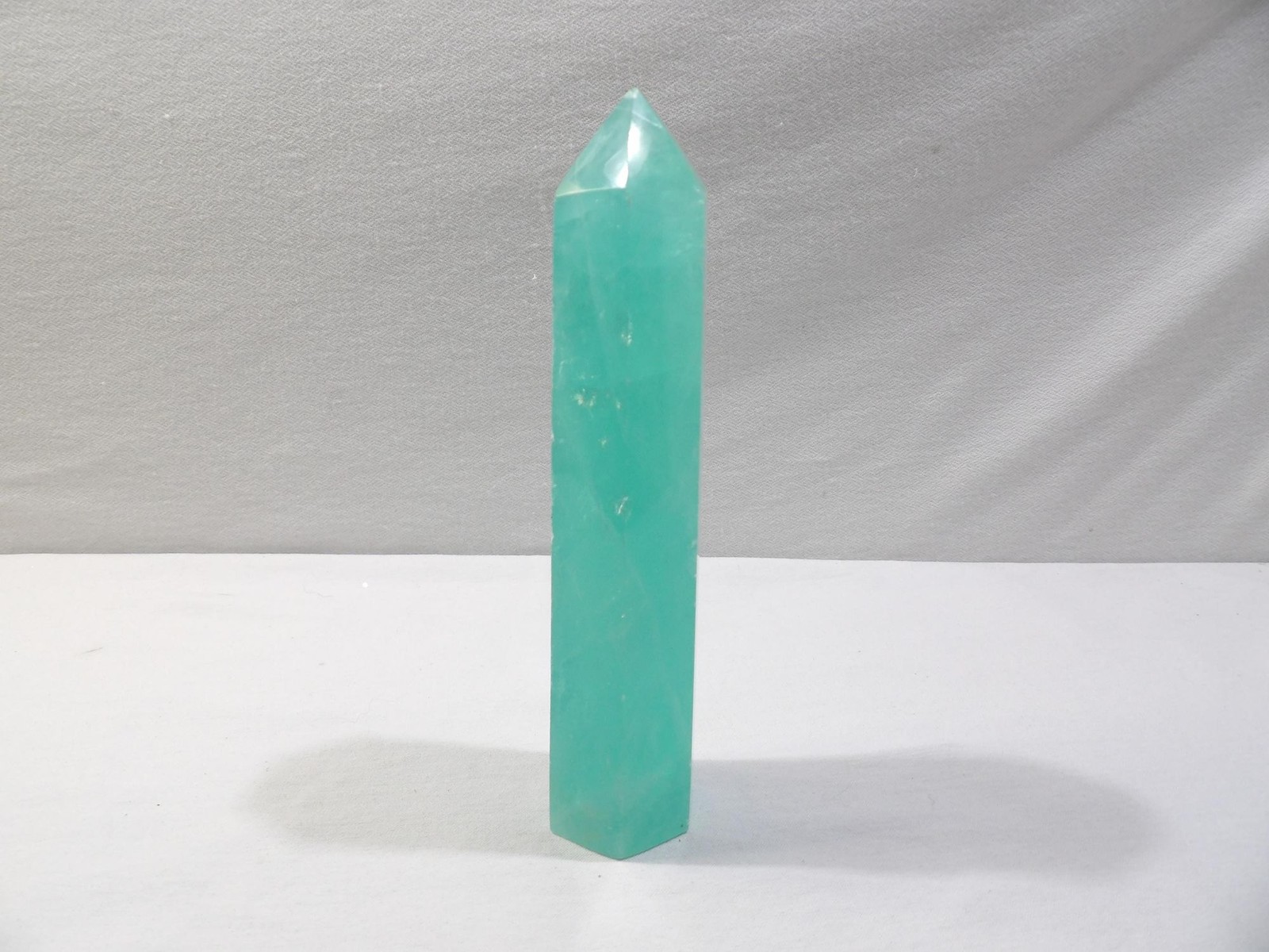 Green fluorite crystal tower, hexagon column obelisk, 6.75L X 1.75W, translucent