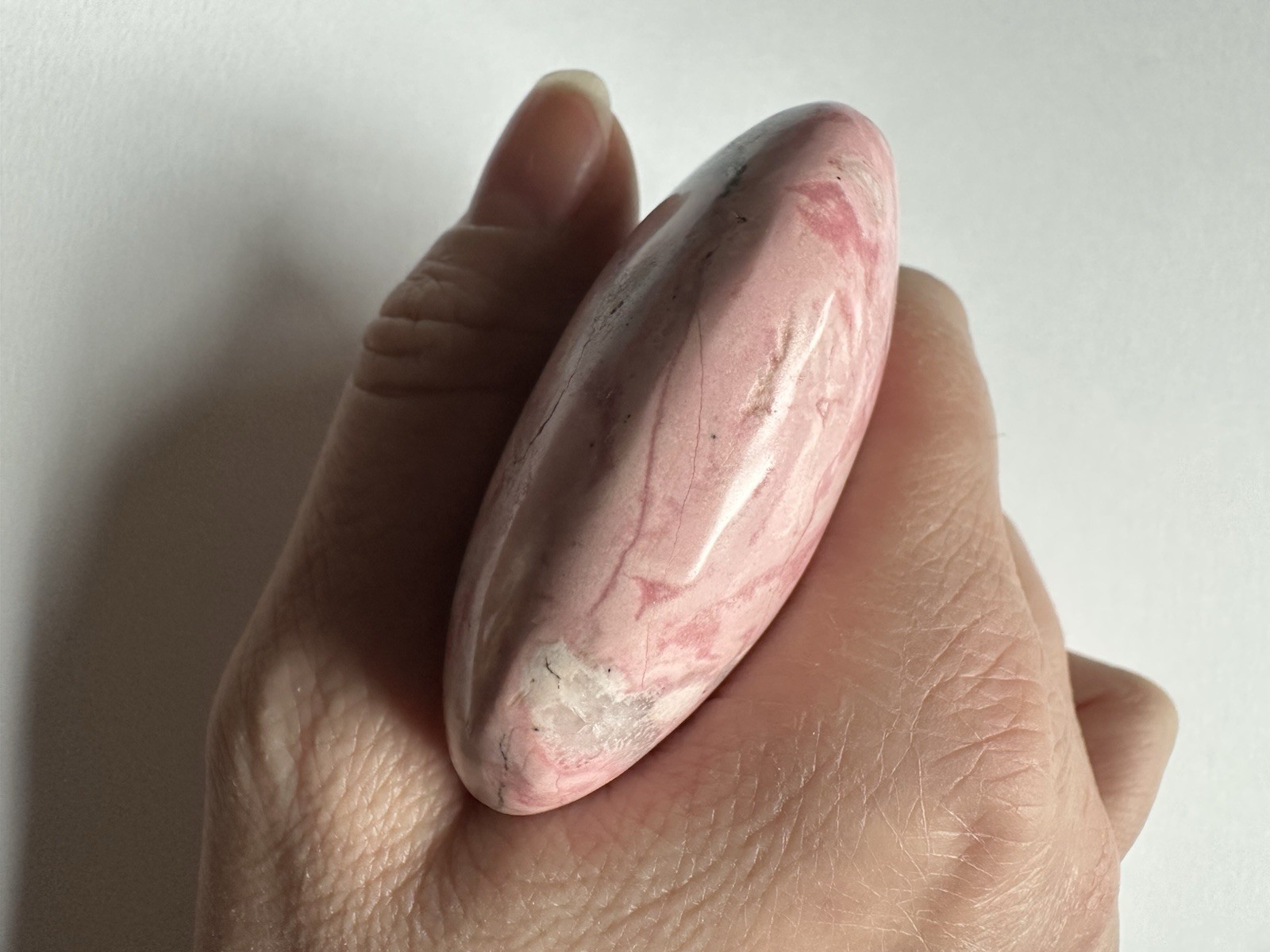 Polished Pink Rhodonite Palm Stone, Oval Egg Shape Mineral Specimen, 3 in
