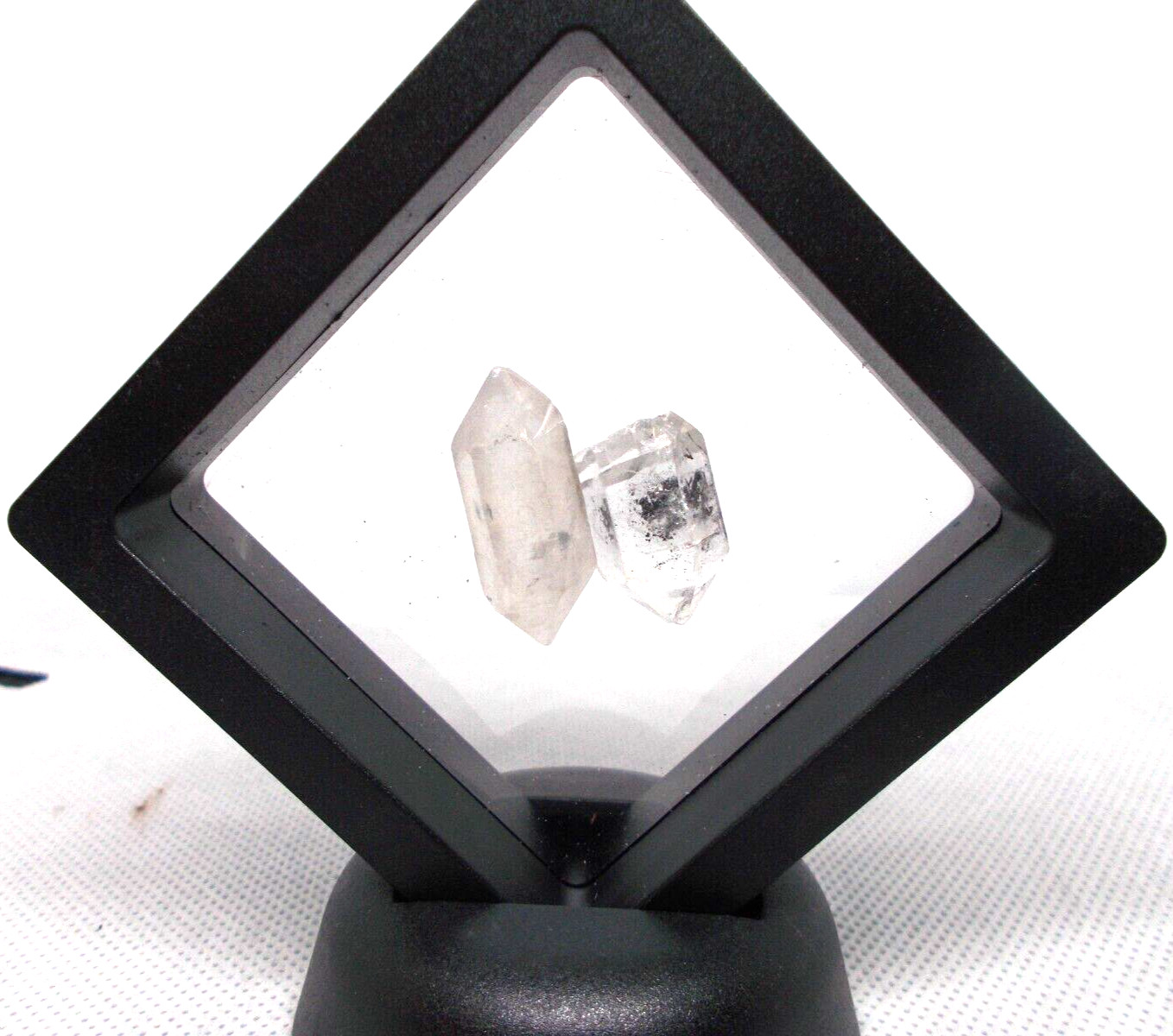 2 Hermiker diamonds 1″ x 1/2″ in display frame