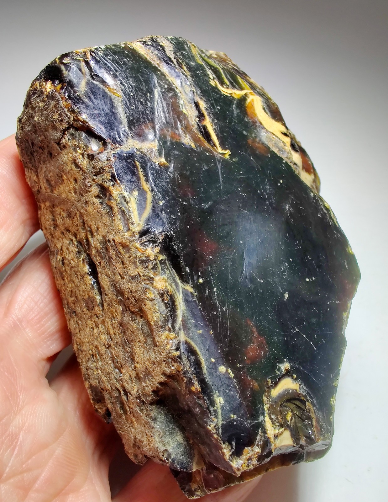 Amber, fluoresces blue. From Sumatra, Indonesia. 188 grams.
