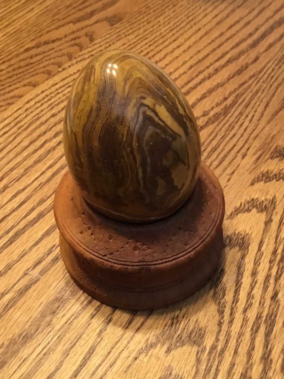 Onyx Naturally Banded Polished Egg With Wooden Stand