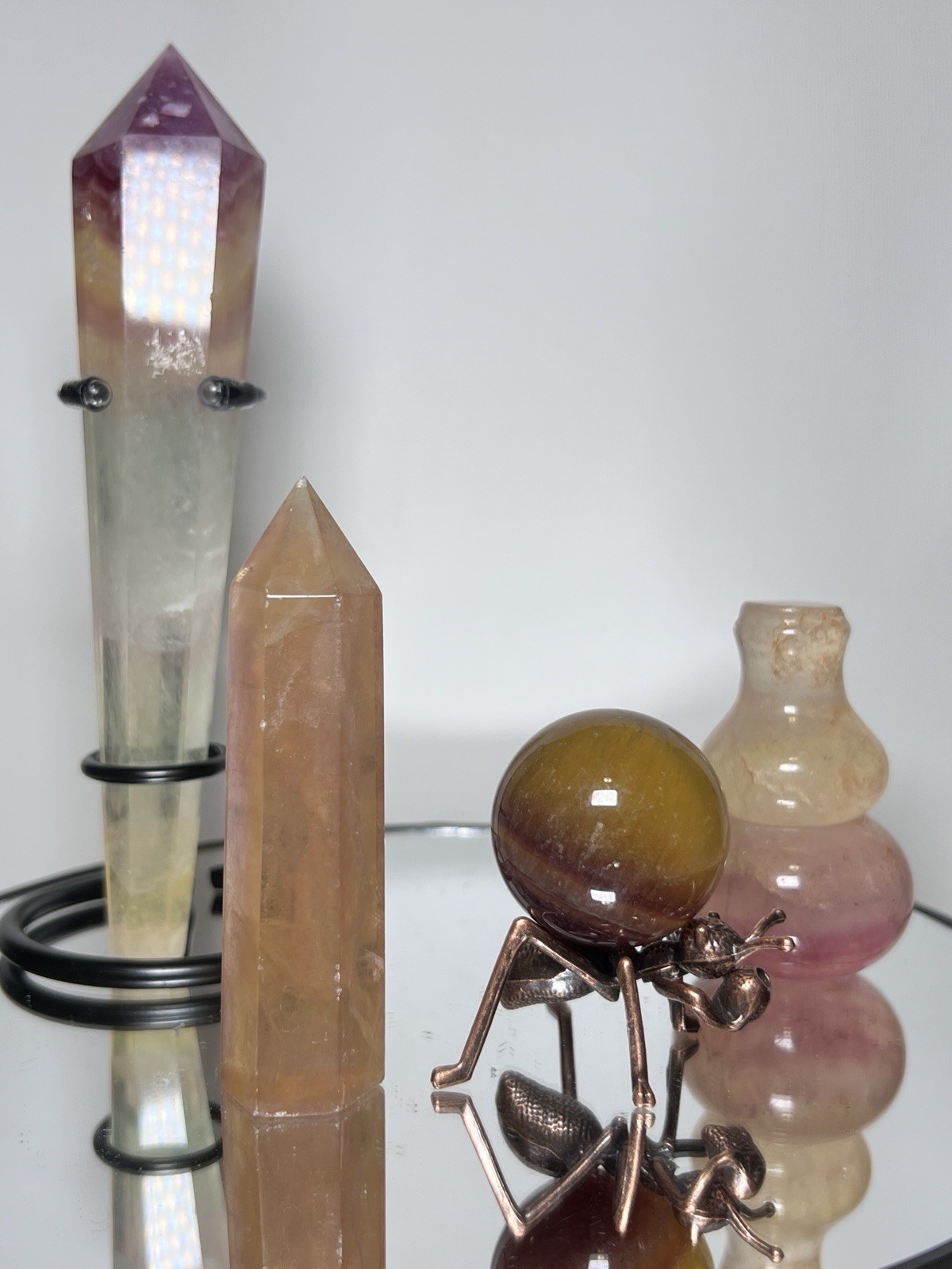 Fluorite 4 Piece Set – Wand, Tower, Hulu Carving, & Sphere (33mm)
