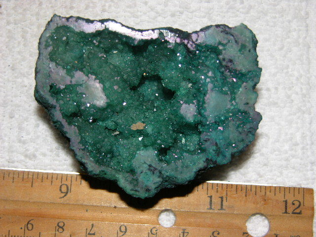 Geode cut & polished half with colored crystal center 3 inch E78