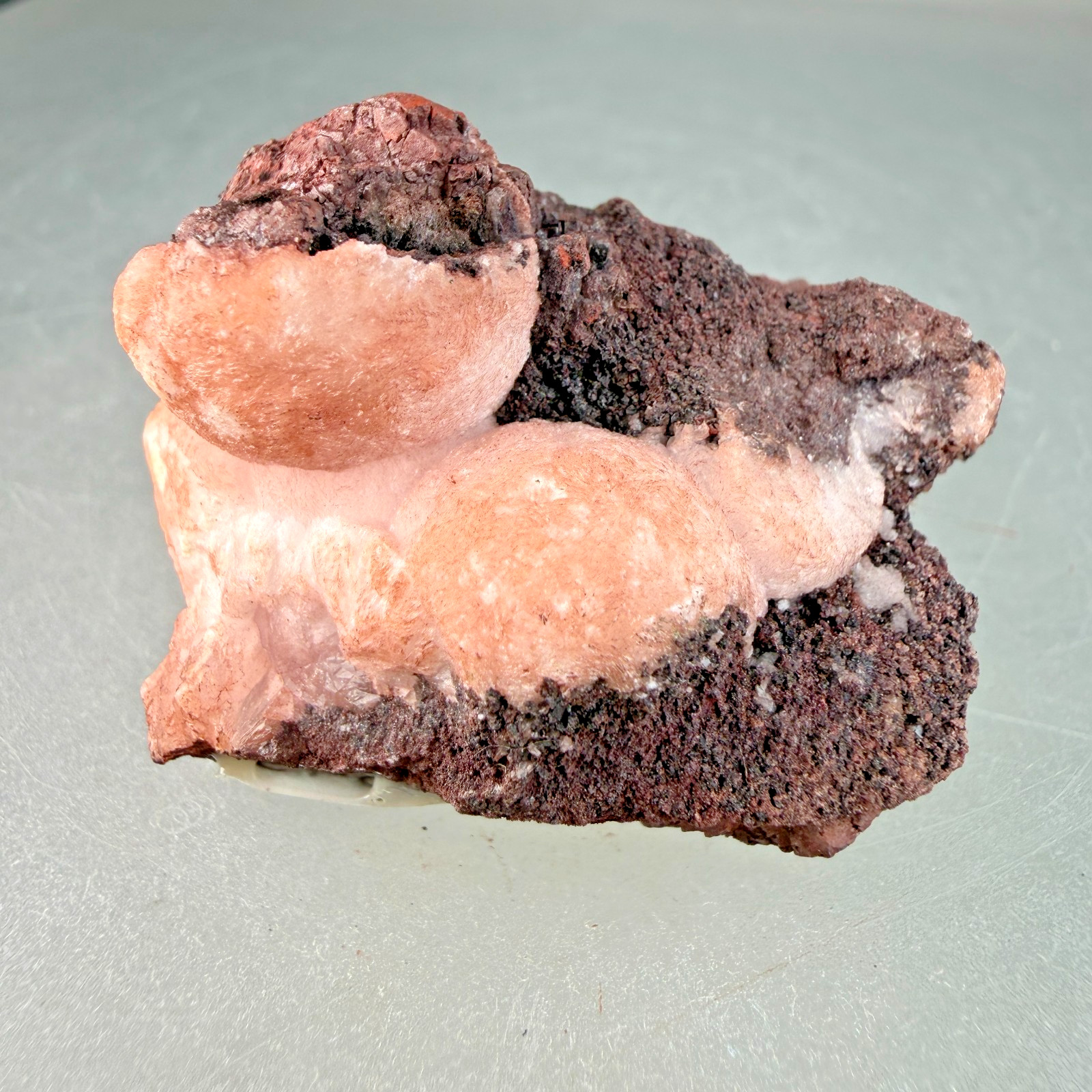 Vibrant Pink Manganocalcite on Hematite: Montreal Mine, Iron County, Wisconsin
