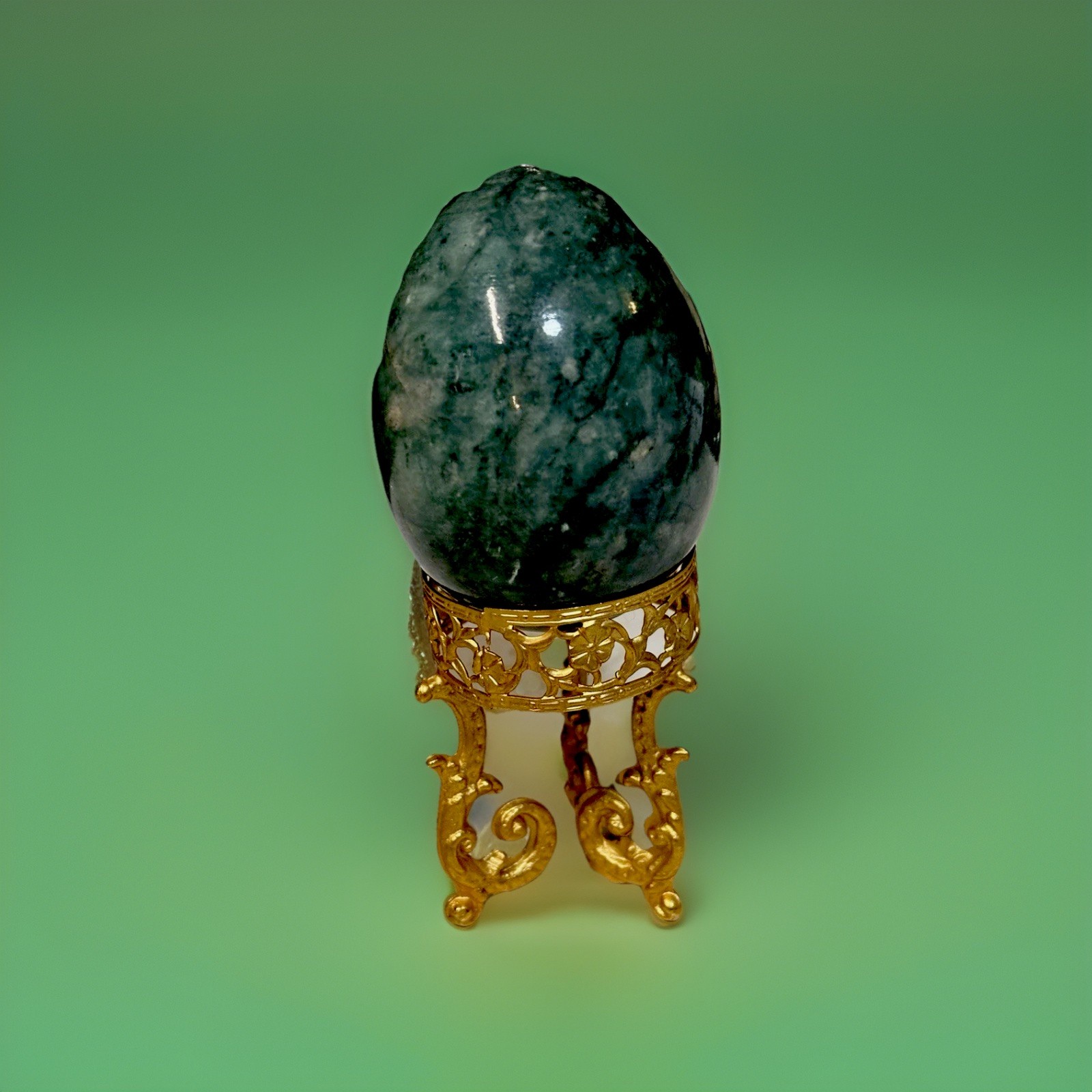 Polished Green Crystal Egg with Ornate Gold Display Stand